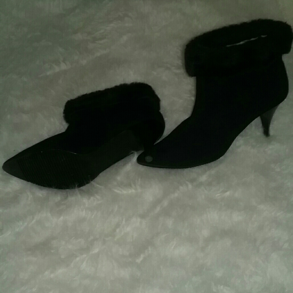 Black boots w/fur at top. 2 1/2 heels